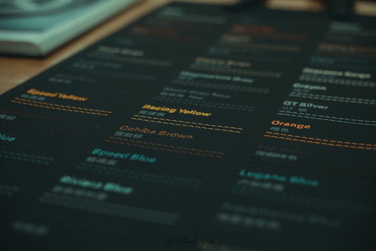 Dark sheet displaying various color names and swatches.