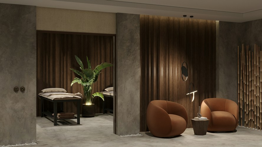 a couple of chairs sitting next to each other in a room