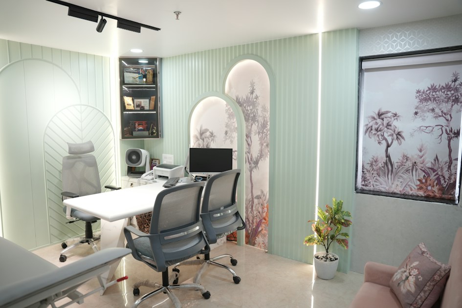 Modern office with desk, chairs, and computer